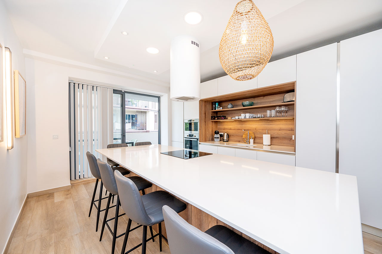 Kitchen with island and pendant light