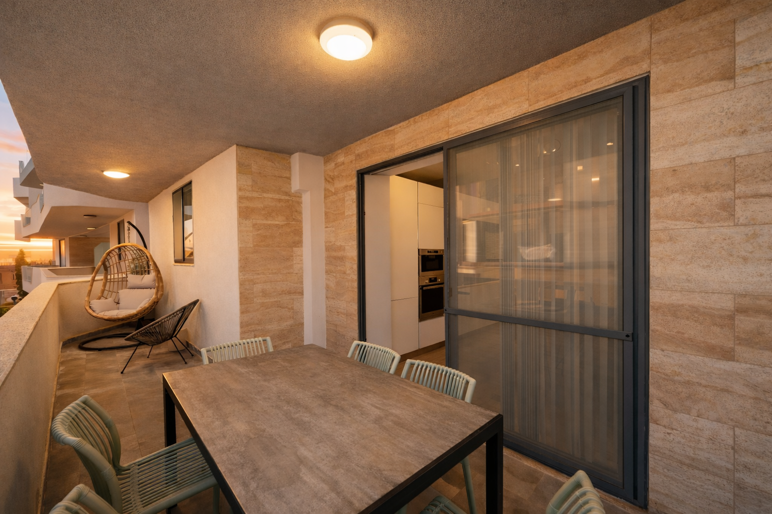 Large balcony with dining table